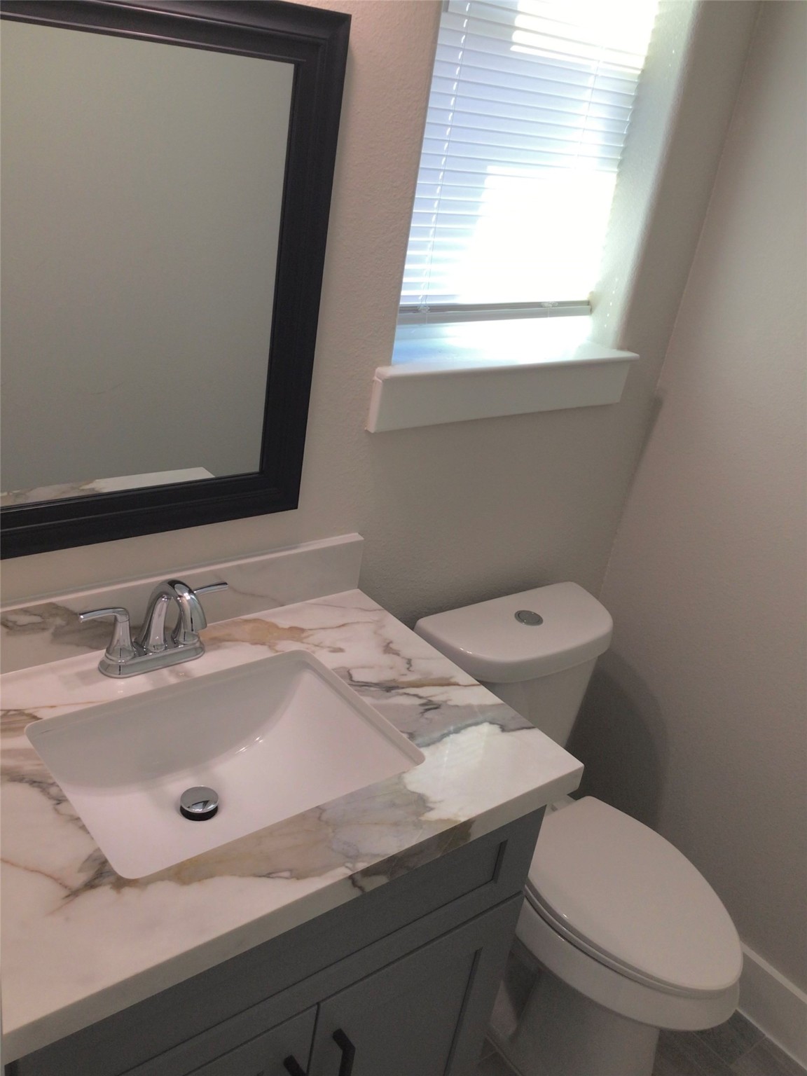 2109 Marnel Road, Unit F Houston, TX 77055 - Photo 21 of 29 a bathroom with a sink and a toilet