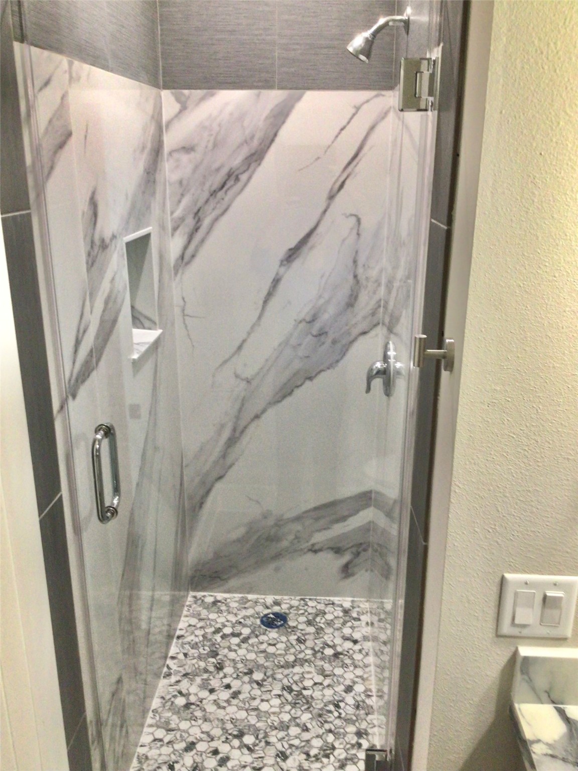 2109 Marnel Road, Unit F Houston, TX 77055 - Photo 24 of 29 a bathroom with a shower and toilet