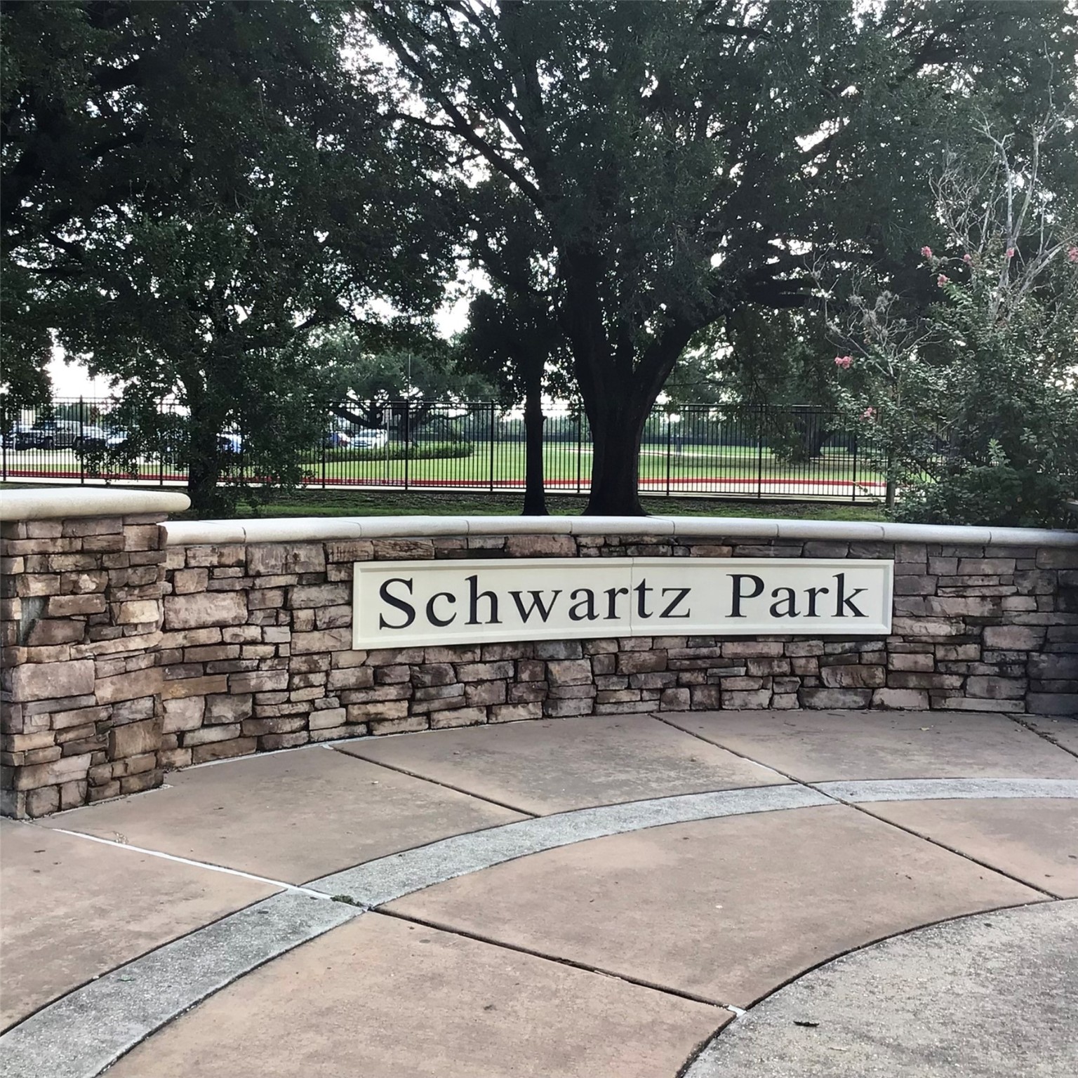 2109 Marnel Road, Unit F Houston, TX 77055 - Photo 26 of 29 a view of a parking space with trees