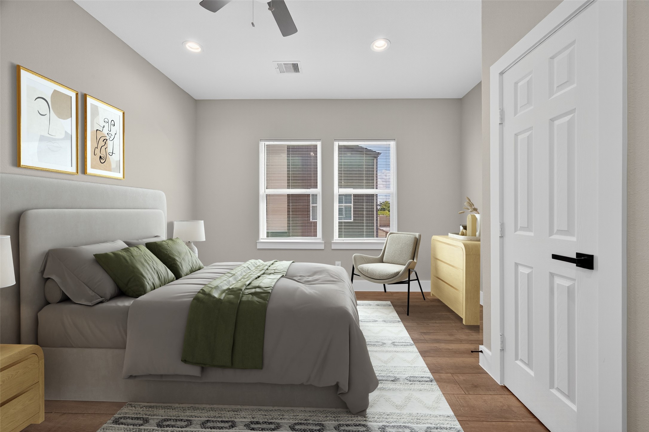 2109 Marnel Road, Unit F Houston, TX 77055 - Photo 7 of 29 a bedroom with a bed and wooden floor