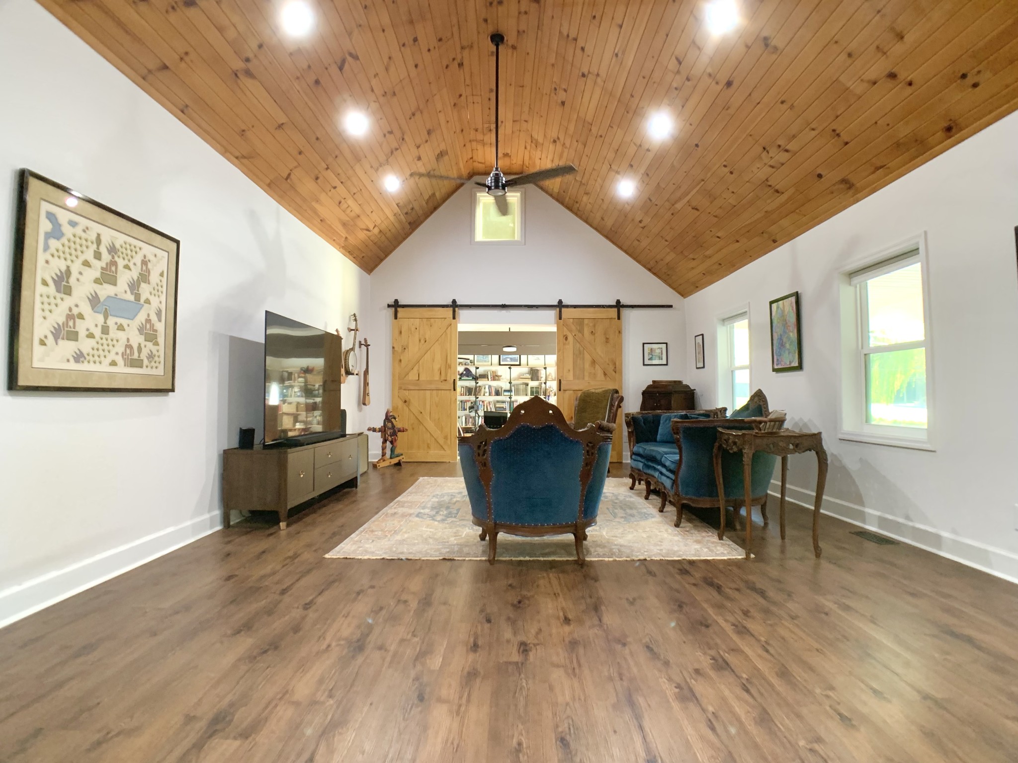 3979 Lem Davis Road Cunningham, TN 37052 - Photo 12 of 70 a living room with furniture a window and a chandelier