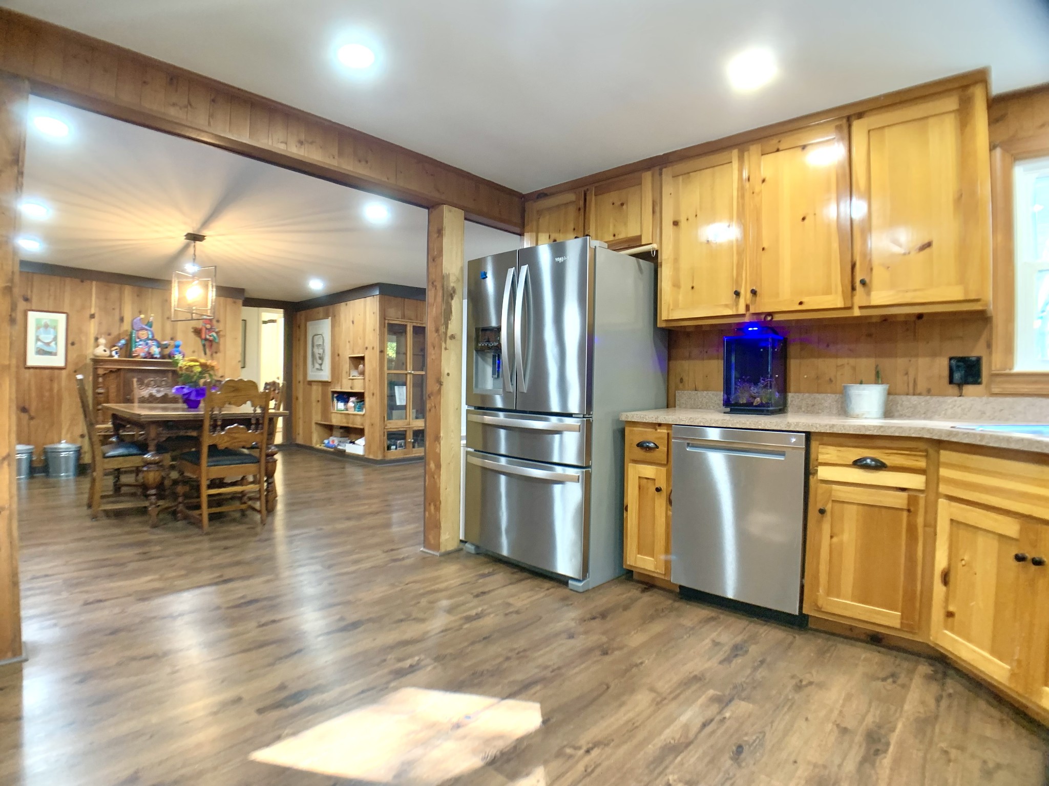3979 Lem Davis Road Cunningham, TN 37052 - Photo 22 of 70 a kitchen with stainless steel appliances a refrigerator and wooden floor