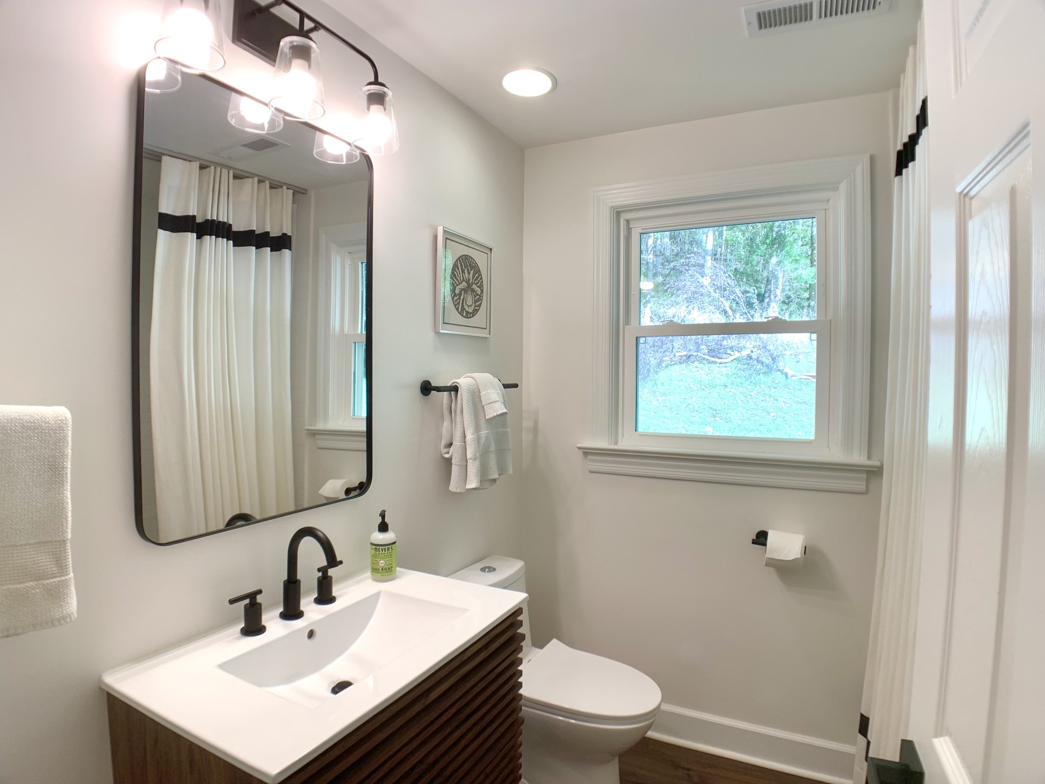 3979 Lem Davis Road Cunningham, TN 37052 - Photo 29 of 70 a bathroom with a sink a toilet and shower