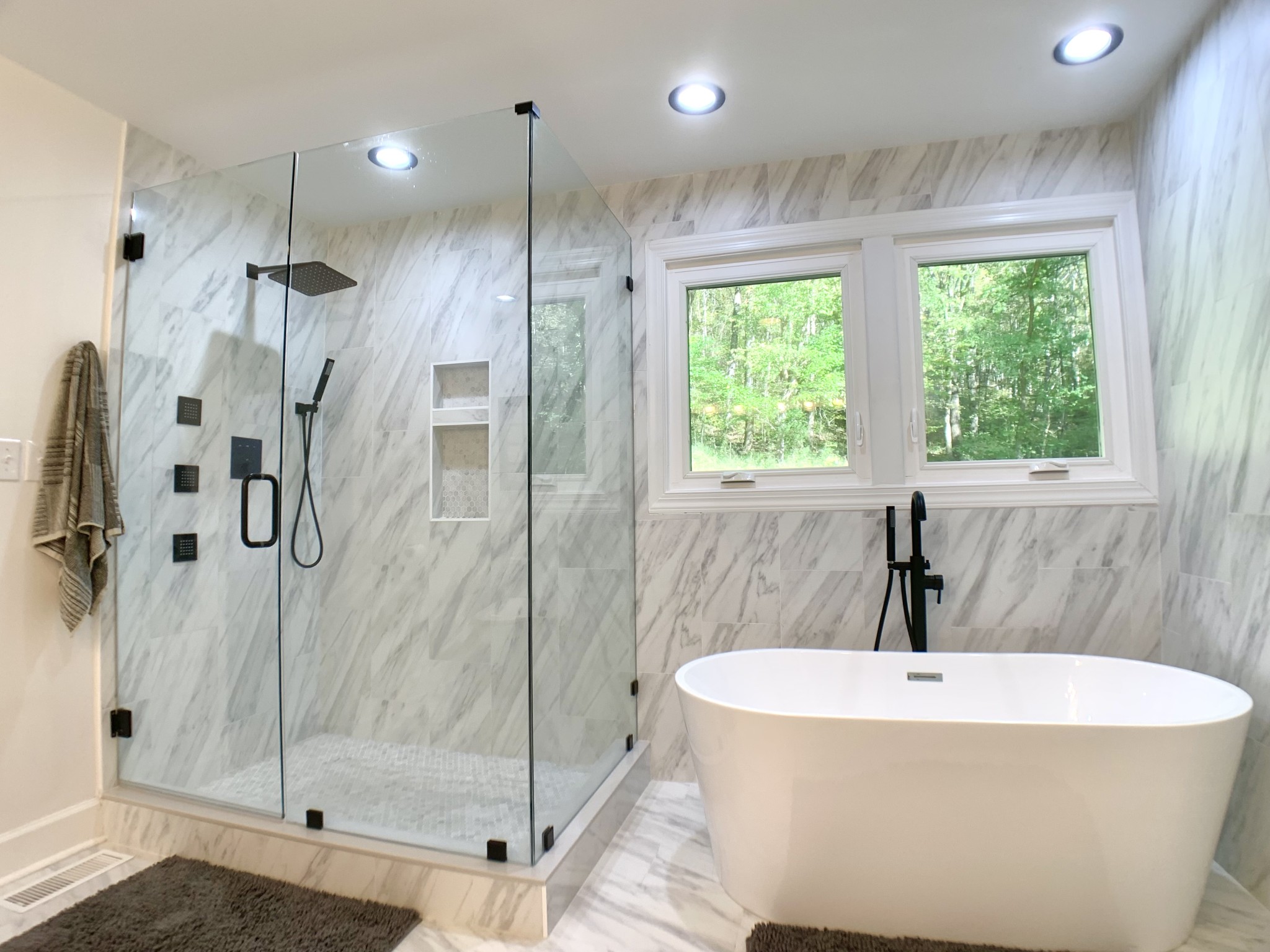 3979 Lem Davis Road Cunningham, TN 37052 - Photo 38 of 70 a bathroom with a bathtub and shower