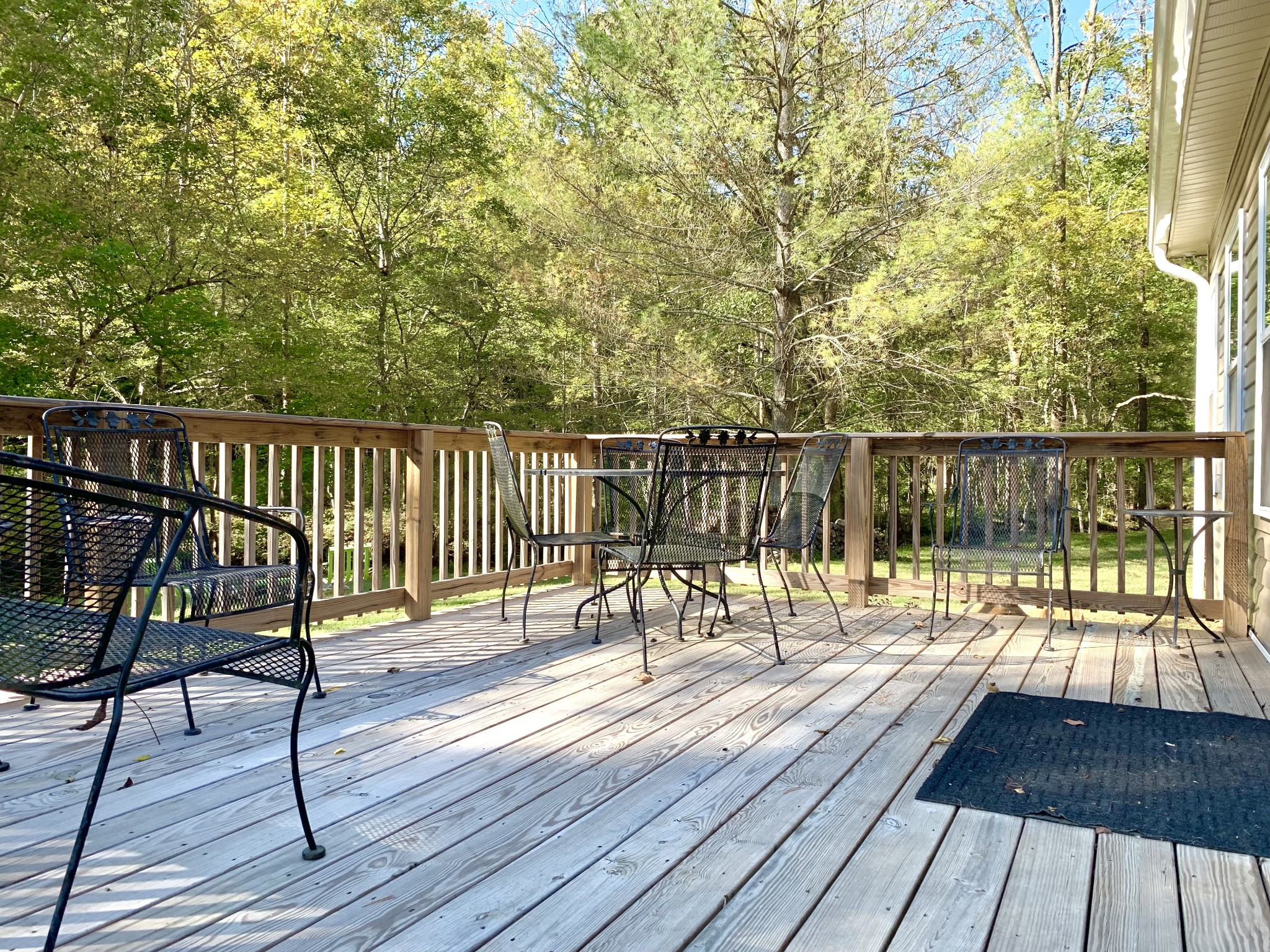 3979 Lem Davis Road Cunningham, TN 37052 - Photo 48 of 70 a view of balcony with wooden floor and outdoor seating