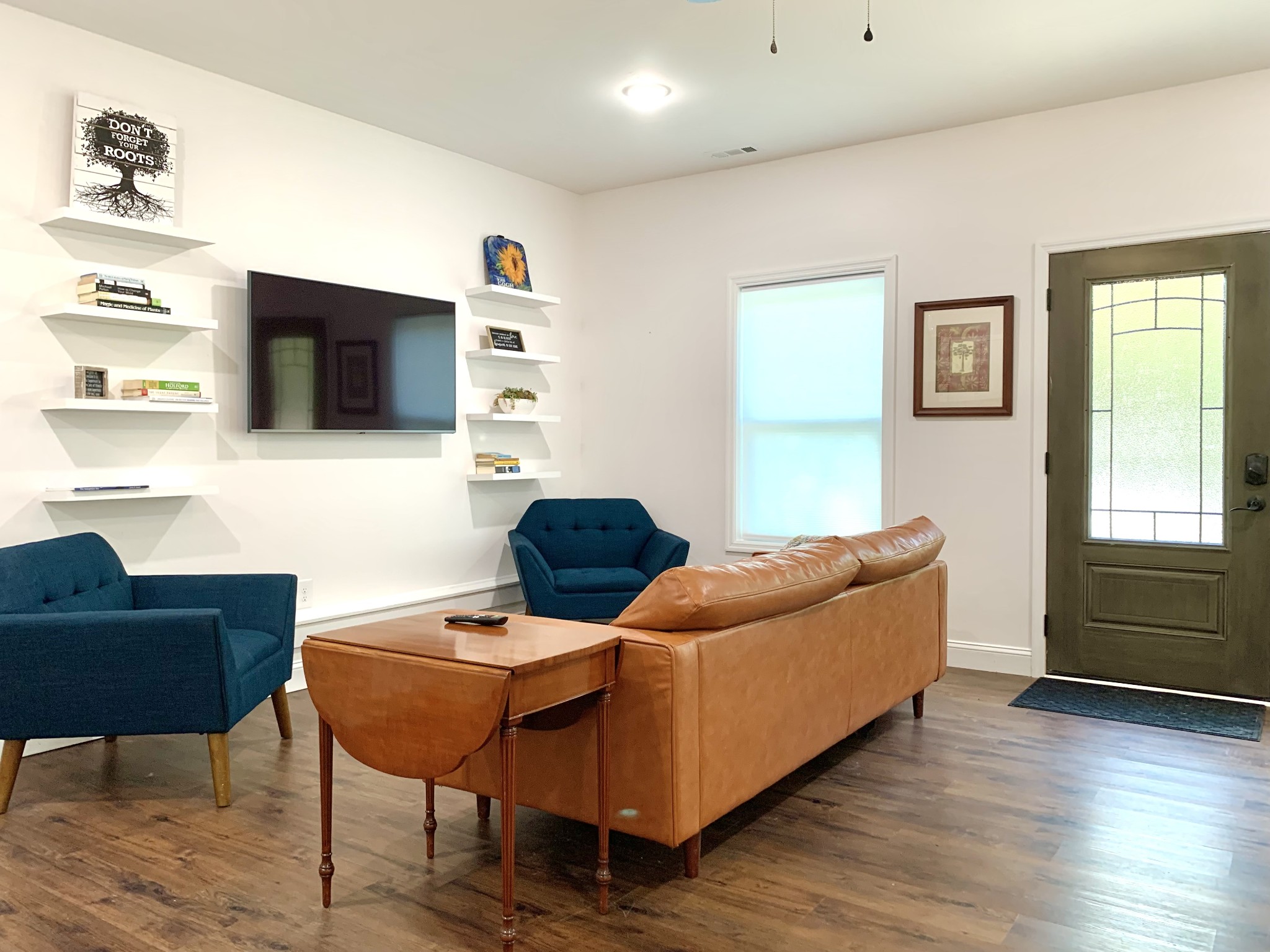 3979 Lem Davis Road Cunningham, TN 37052 - Photo 51 of 70 a living room with furniture and a flat screen tv