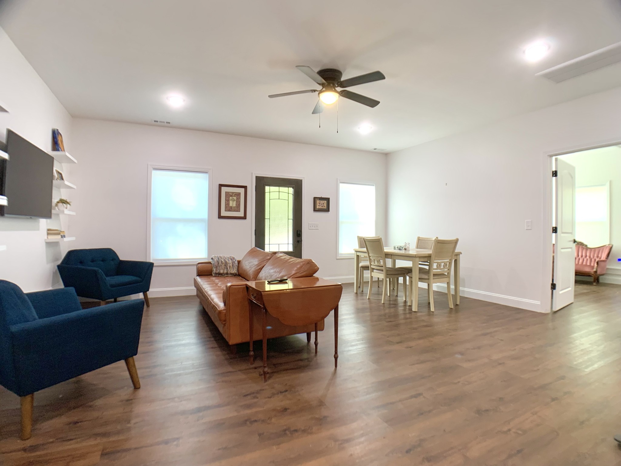 3979 Lem Davis Road Cunningham, TN 37052 - Photo 55 of 70 a living room with furniture and a wooden floor