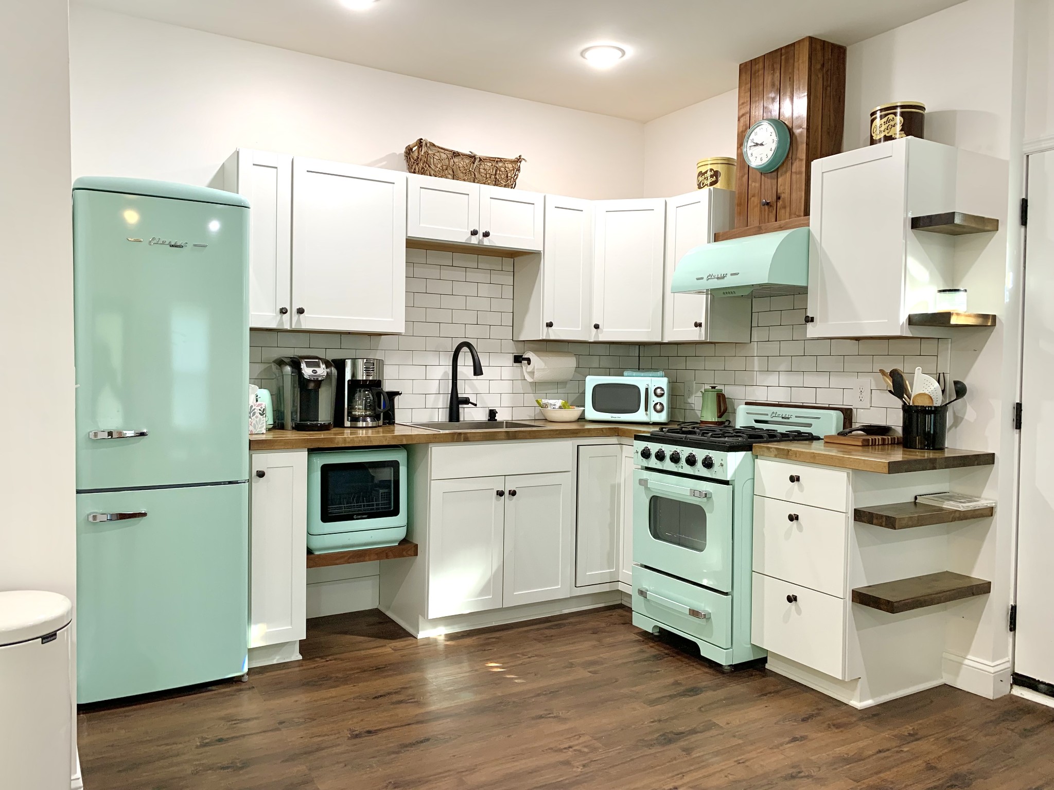 3979 Lem Davis Road Cunningham, TN 37052 - Photo 56 of 70 a kitchen with a white cabinets and white appliances
