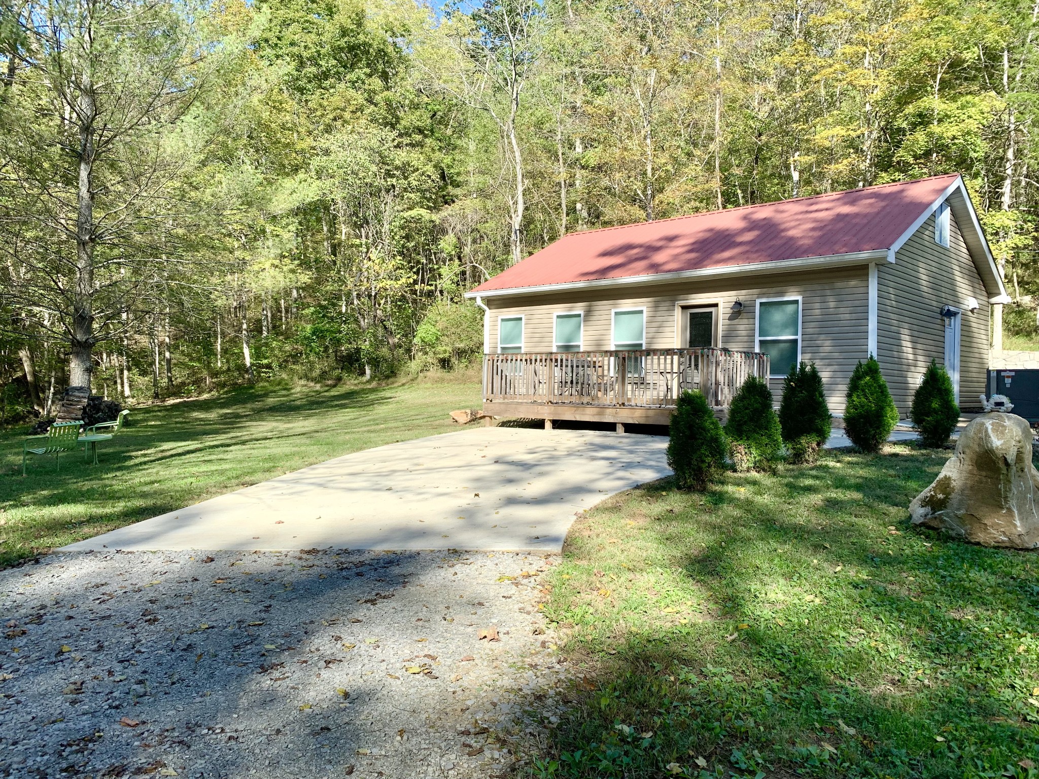 3979 Lem Davis Road Cunningham, TN 37052 - Photo 64 of 70 a view of a house with backyard and sitting area
