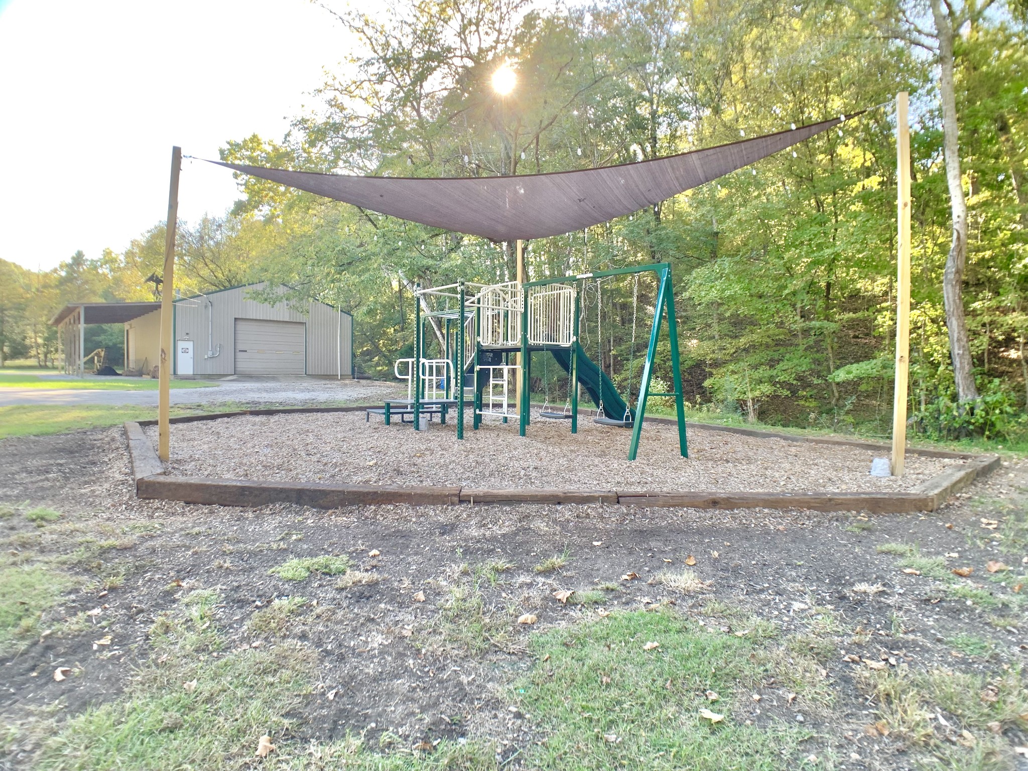 3979 Lem Davis Road Cunningham, TN 37052 - Photo 66 of 70 a view of a yard in front of a house with large tree