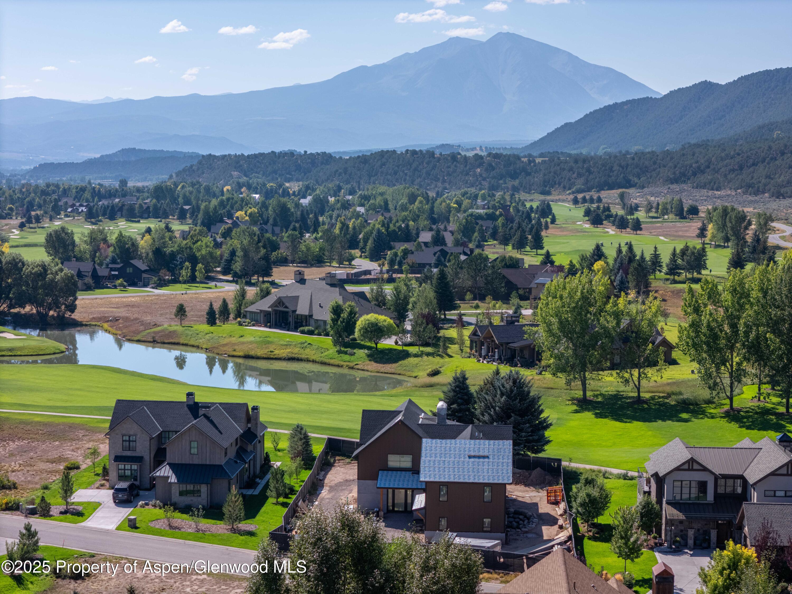 589 Saddleback Road Carbondale, CO 81623 - Photo 2 of 23 an aerial view of a house with outdoor space swimming pool