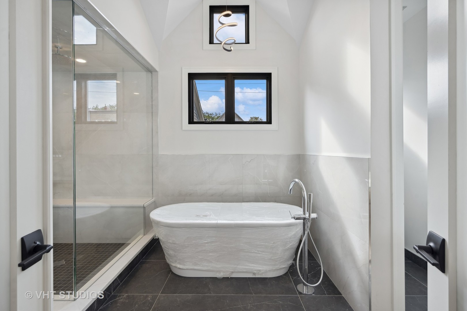 3018 North Seminary Avenue Chicago, IL 60657 - Photo 12 of 62 a bathroom with a bathtub and a shower