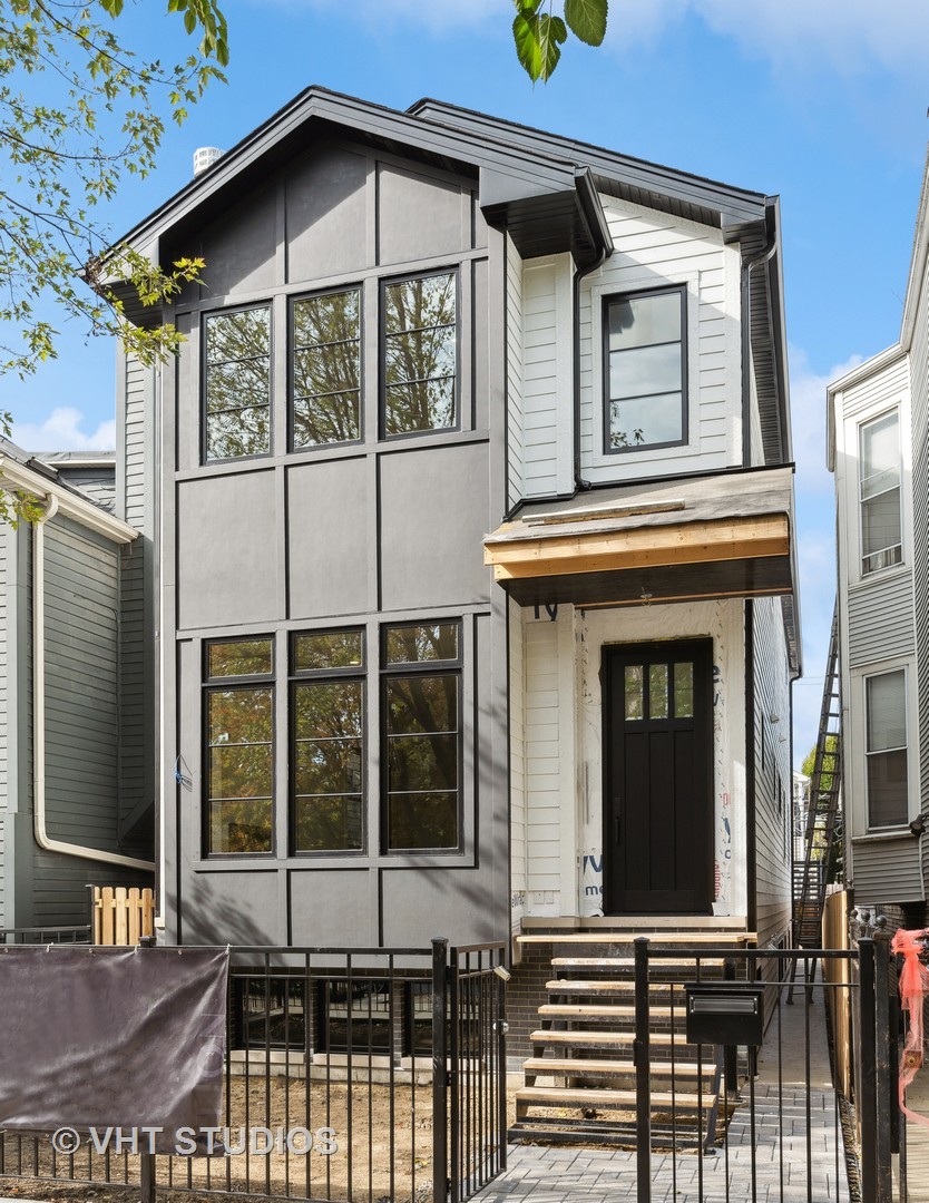 3018 North Seminary Avenue Chicago, IL 60657 - Photo 2 of 62 a front view of a house with glass windows