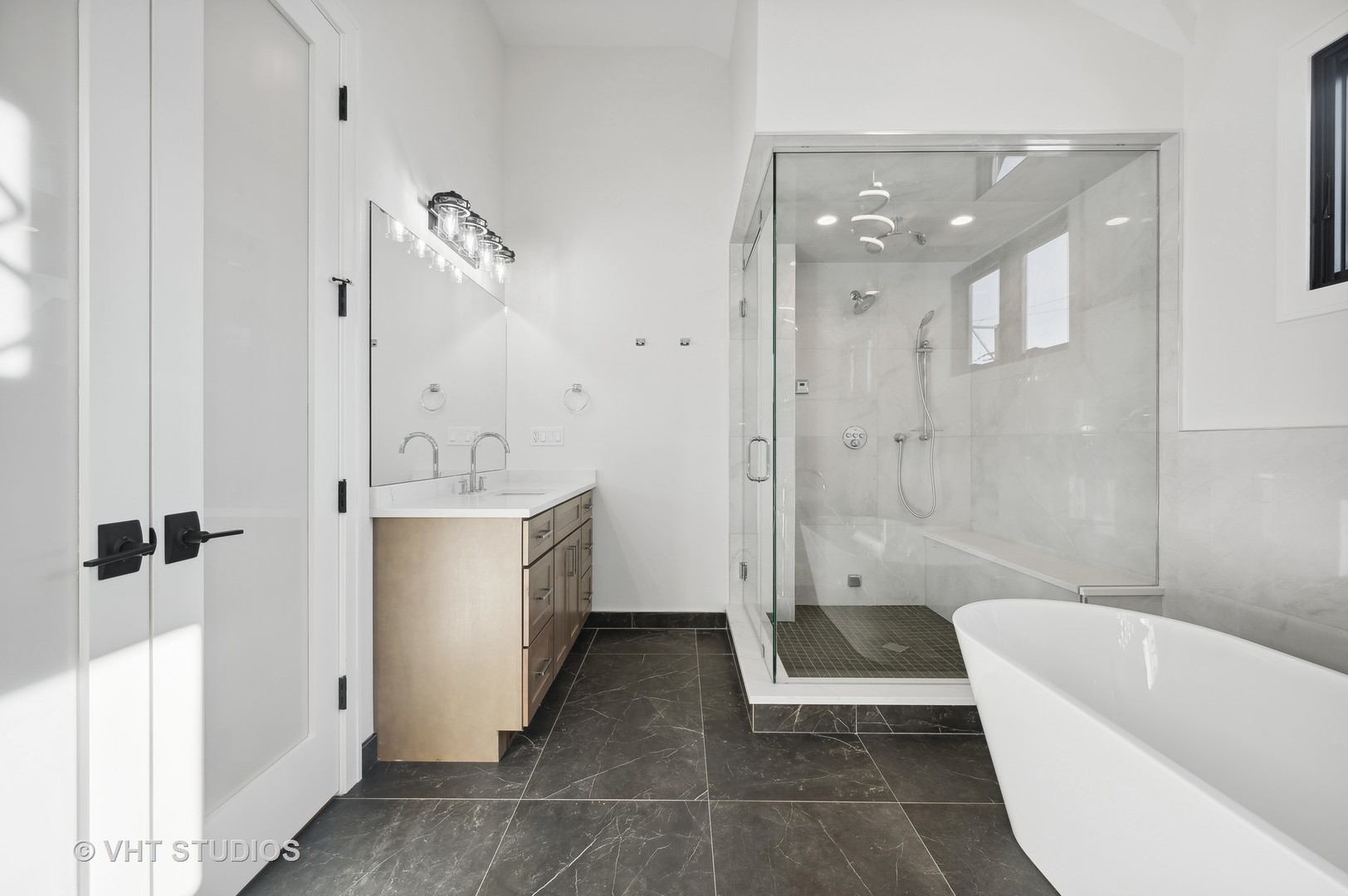 3018 North Seminary Avenue Chicago, IL 60657 - Photo 29 of 62 a bathroom with a bathtub a toilet a sink and shower