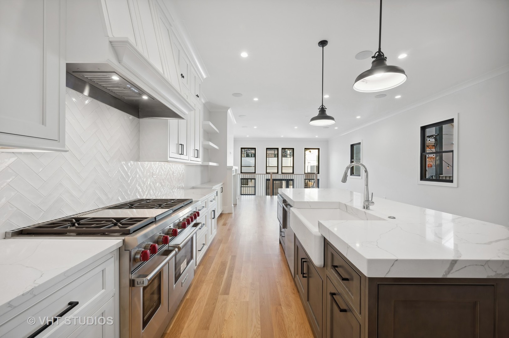 3018 North Seminary Avenue Chicago, IL 60657 - Photo 33 of 62 a kitchen with stainless steel appliances granite countertop a sink a stove and a wooden floors