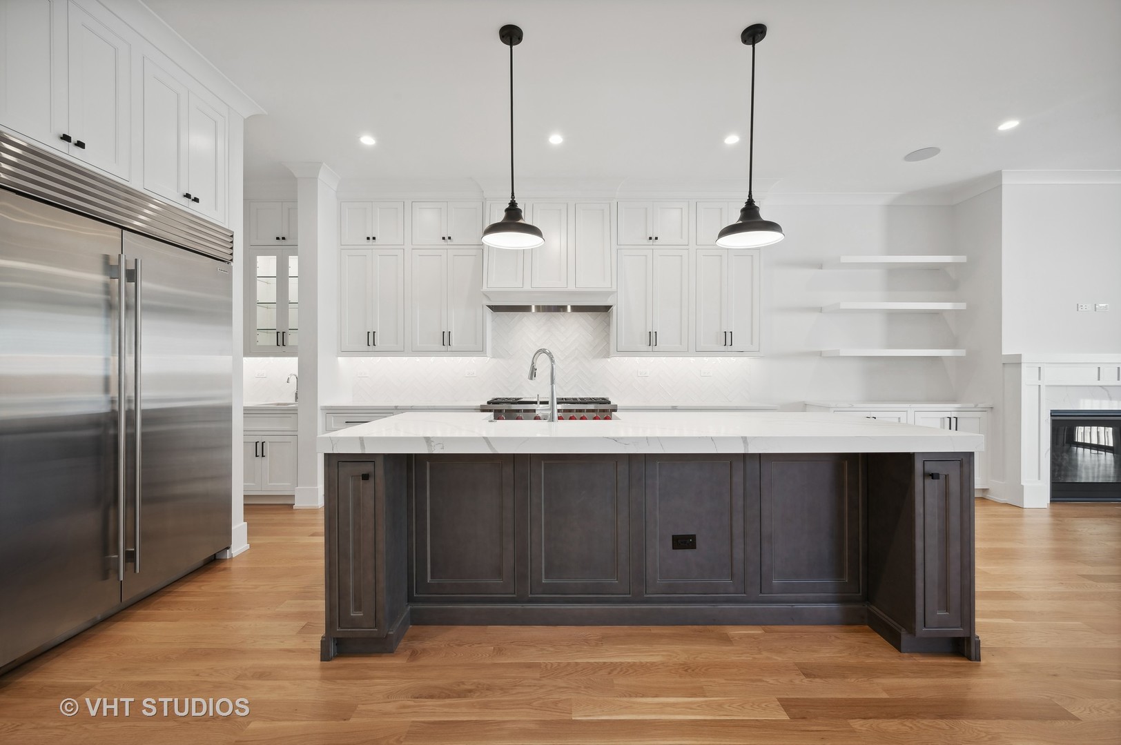 3018 North Seminary Avenue Chicago, IL 60657 - Photo 48 of 62 a kitchen with kitchen island a sink stainless steel appliances and cabinets