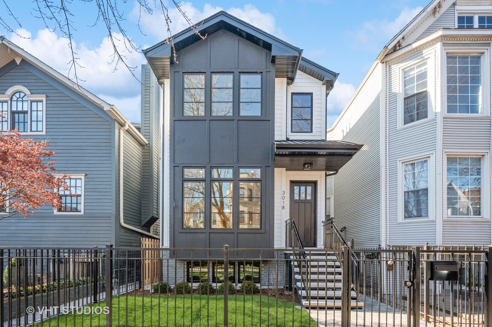 3018 North Seminary Avenue Chicago, IL 60657 - Photo 51 of 62 a front view of a house with glass windows and brick walls