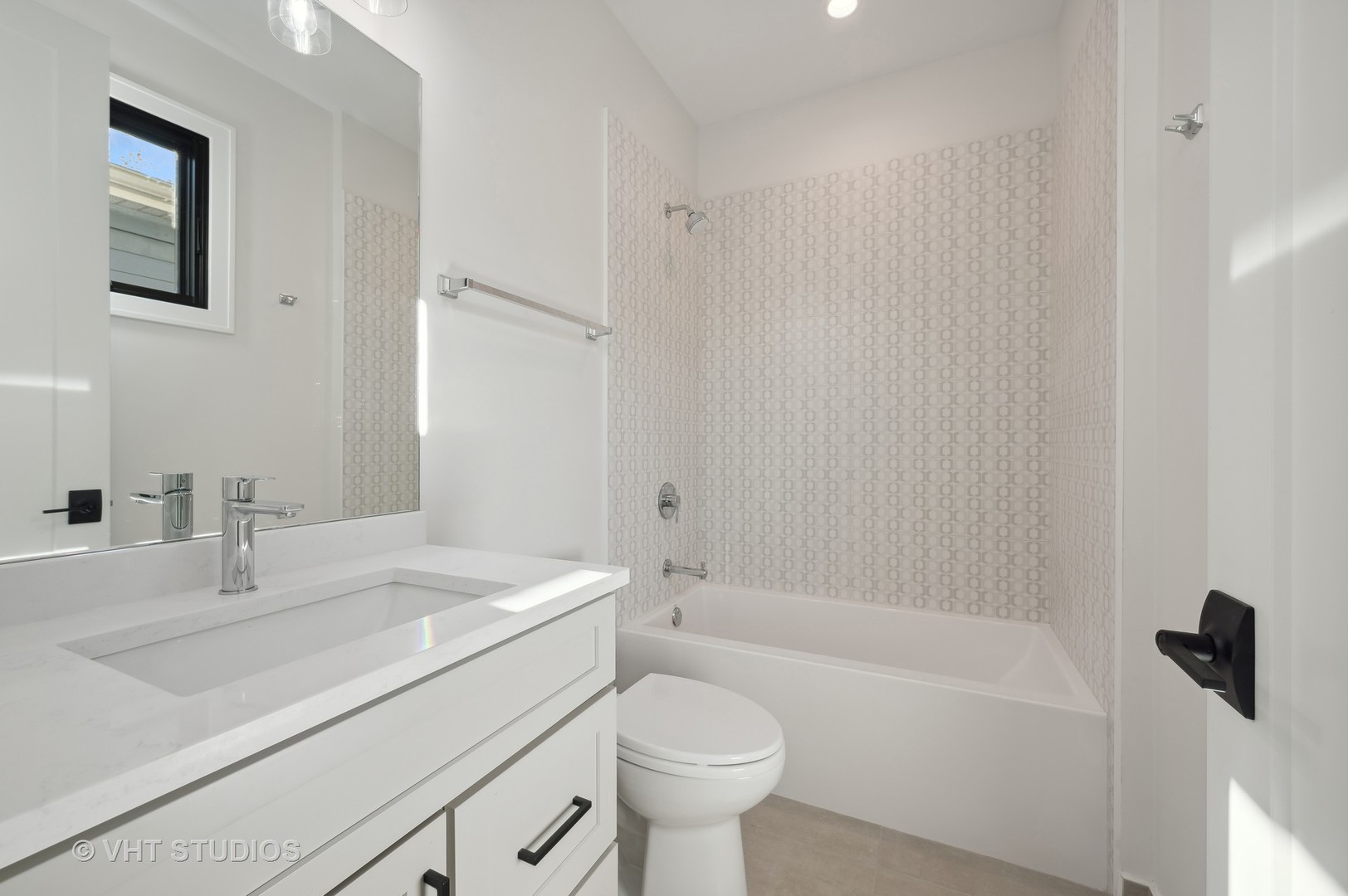 3018 North Seminary Avenue Chicago, IL 60657 - Photo 54 of 62 a bathroom with a sink a toilet and a bathtub