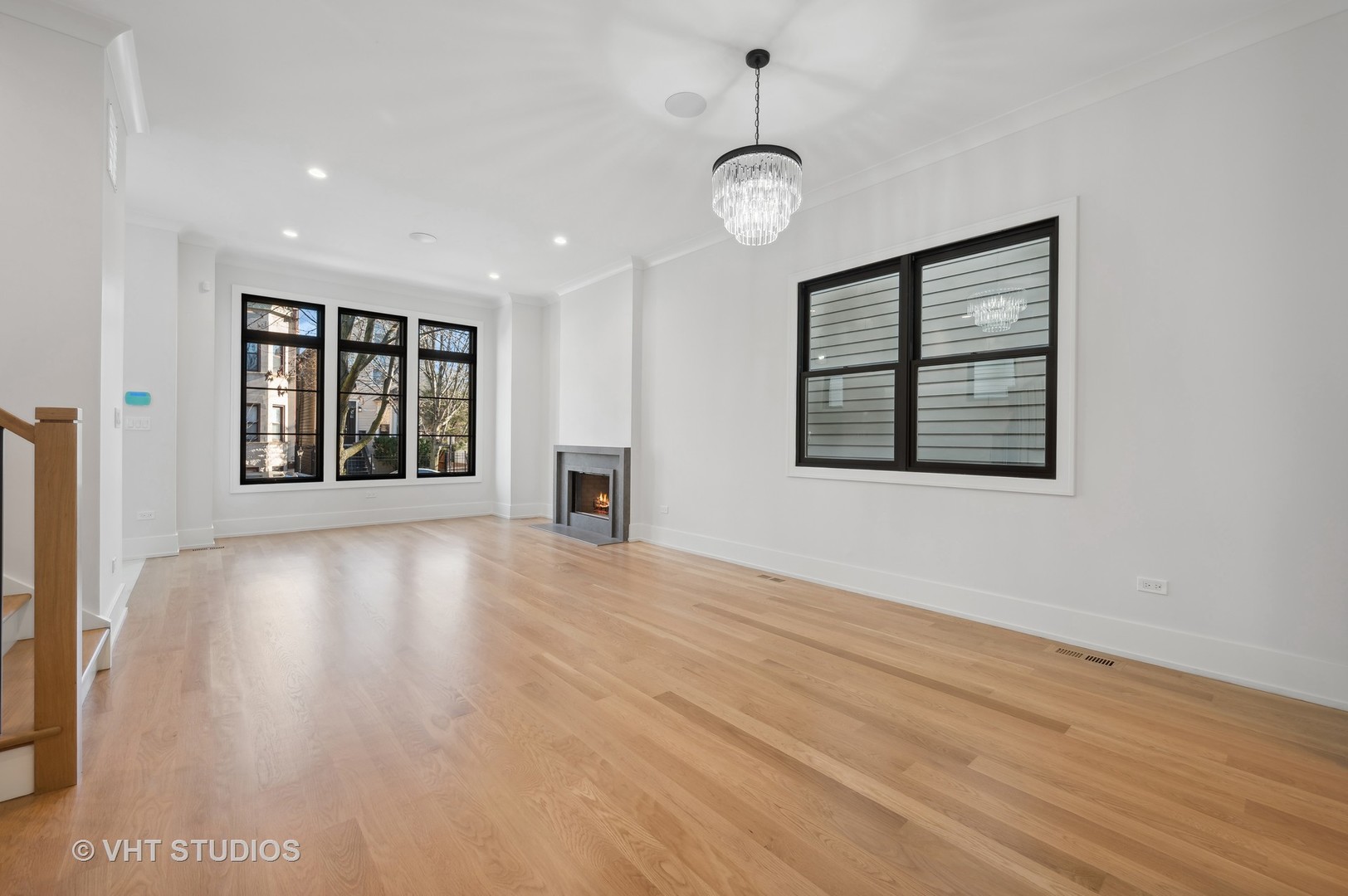 3018 North Seminary Avenue Chicago, IL 60657 - Photo 60 of 62 a view of an empty room with a window and wooden floor