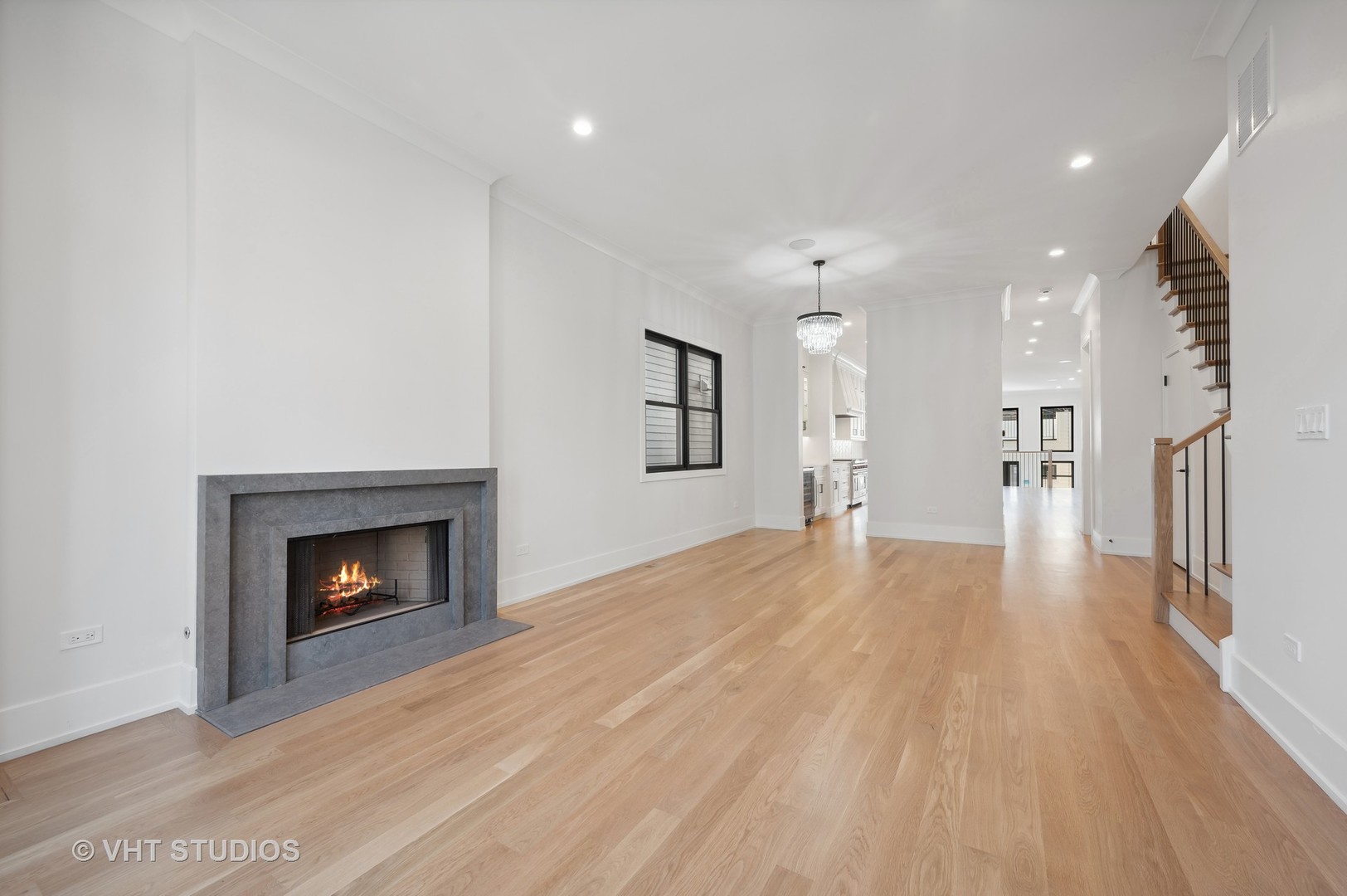 3018 North Seminary Avenue Chicago, IL 60657 - Photo 61 of 62 a view of a room with wooden floor and a fireplace