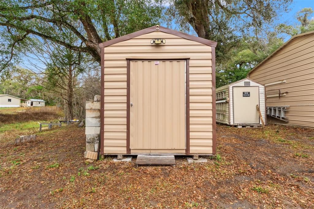 7154 County Road 651 Bushnell, FL 33513 - Photo 24 of 34 a front view of a house with a yard