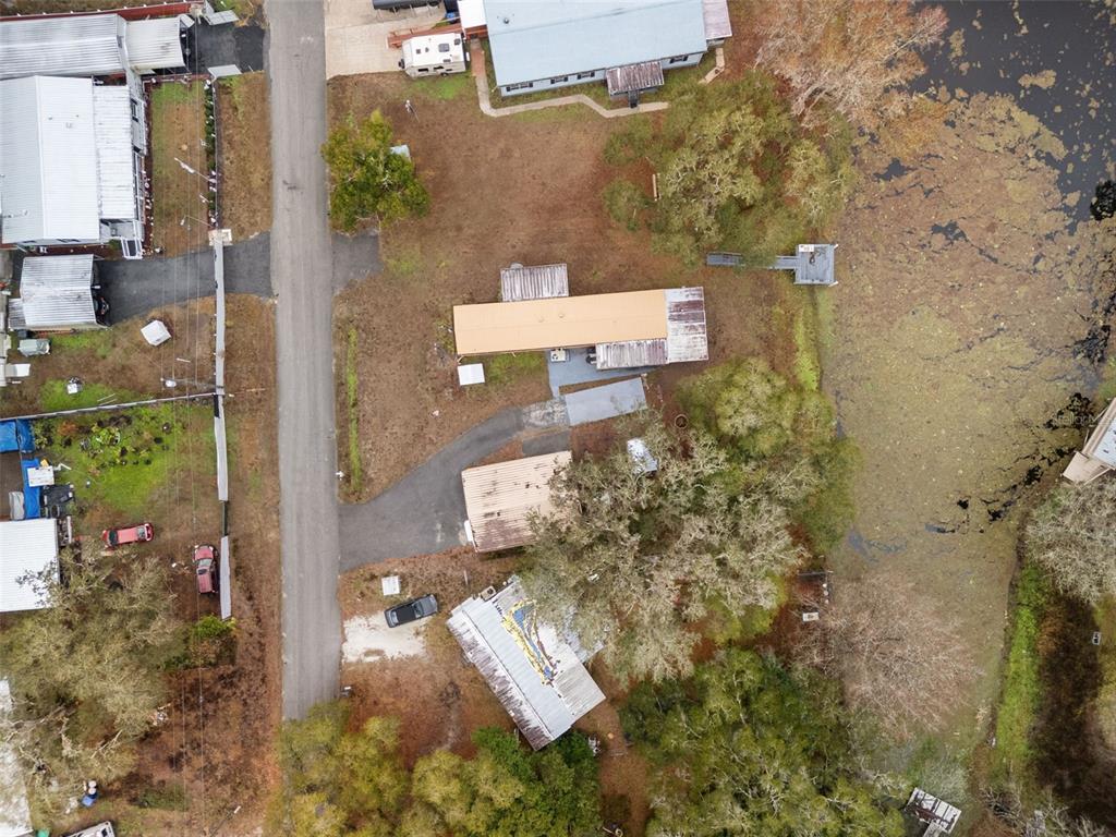 7154 County Road 651 Bushnell, FL 33513 - Photo 34 of 34 an aerial view of residential house with outdoor space