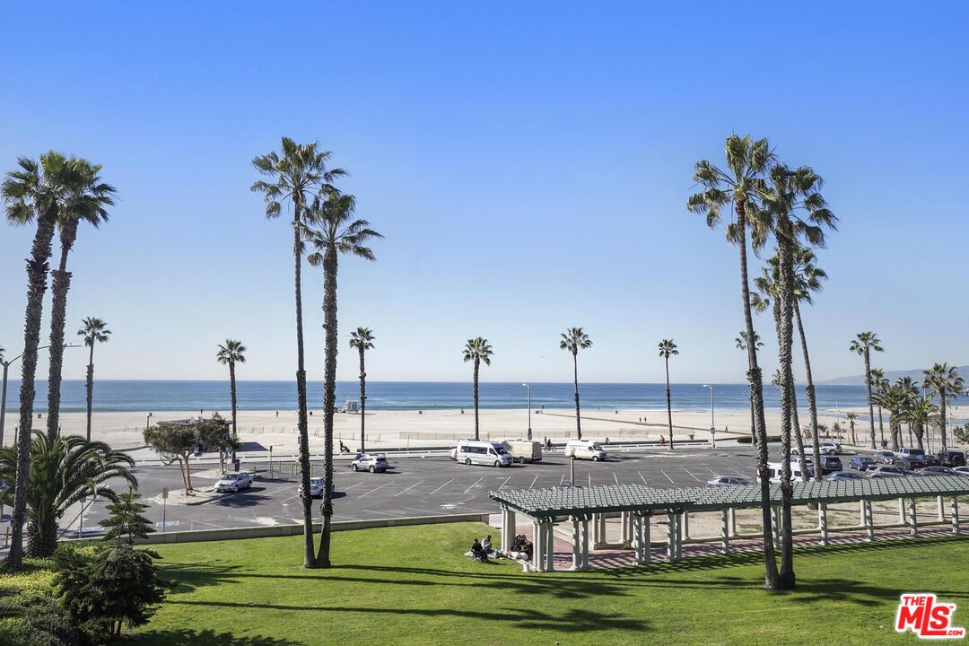 2101 Ocean Avenue, Unit 1 Santa Monica, CA 90405 - Photo 2 of 11 a view of a lake with a palm tree