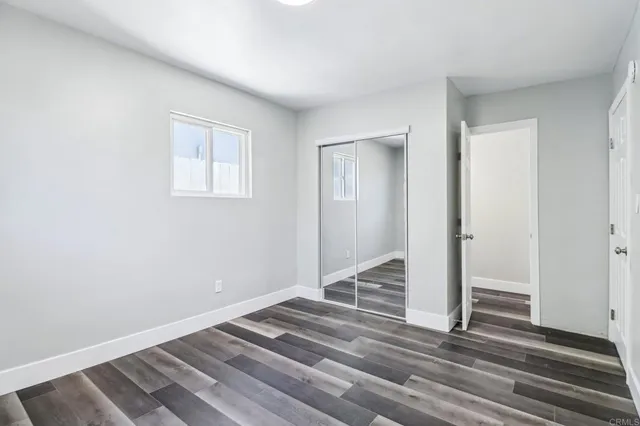a bathroom with a sink a mirror and a bathtub