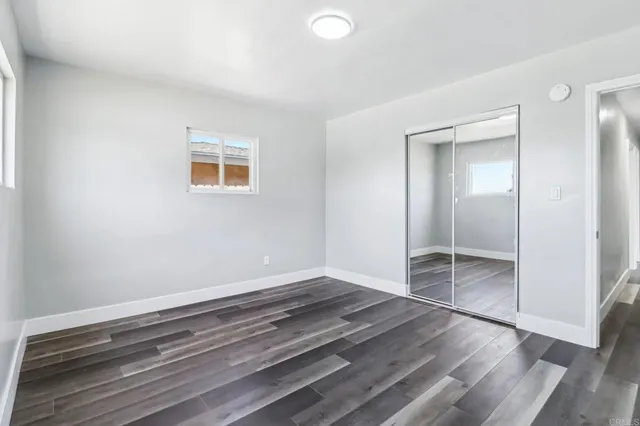 a view of a house with outdoor space and sitting area