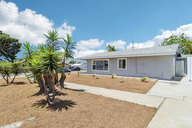 a view of outdoor space yard and front view of a house