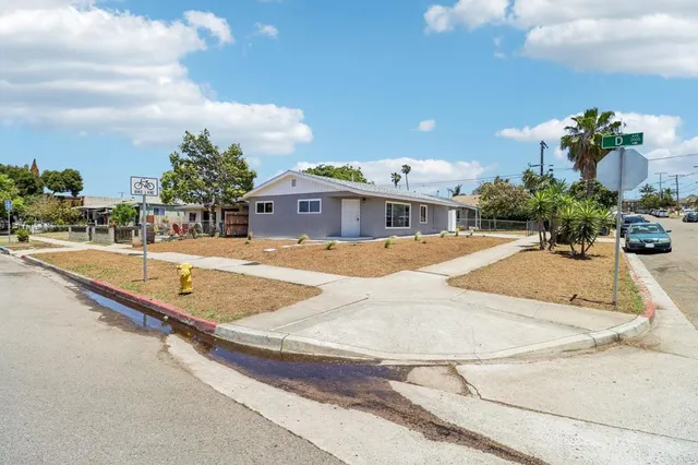 a view of a house with wooden stairs