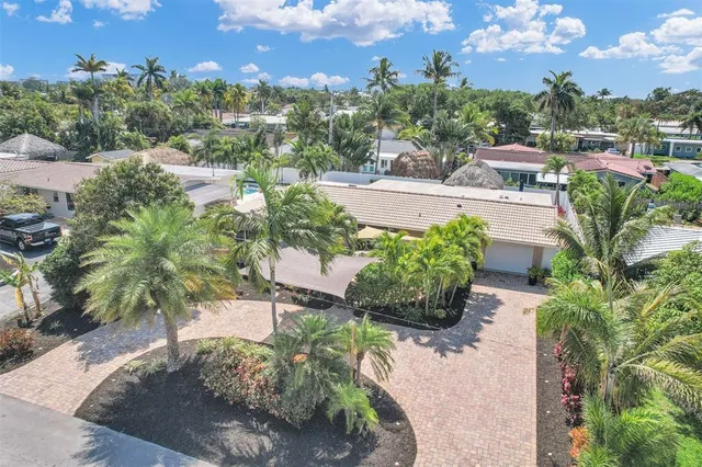 an aerial view of residential house with outdoor space