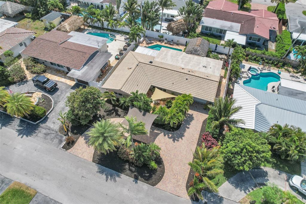 1616 Southeast 4th Street Deerfield Beach, FL 33441 - Photo 2 of 52 an aerial view of residential house with outdoor space