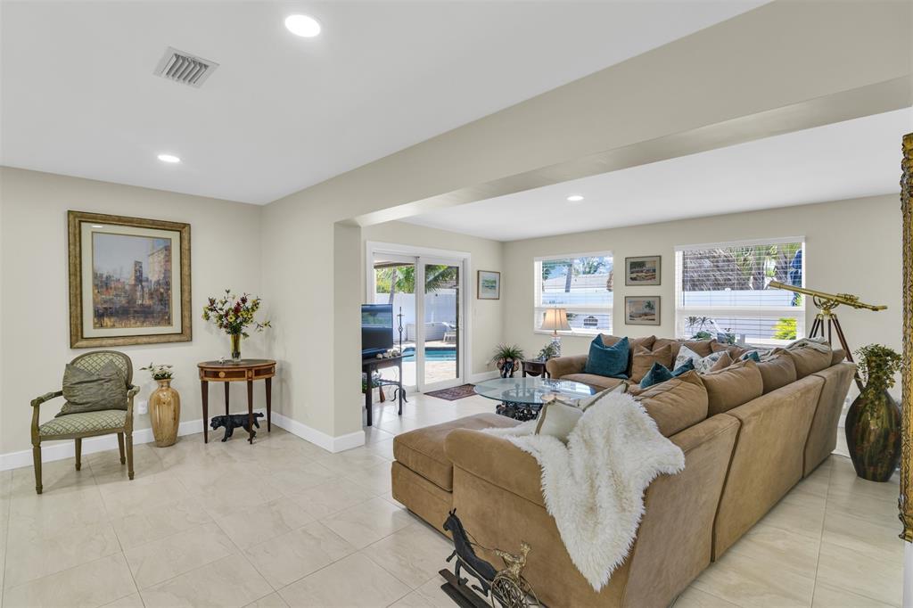 1616 Southeast 4th Street Deerfield Beach, FL 33441 - Photo 29 of 52 a living room with furniture and a window
