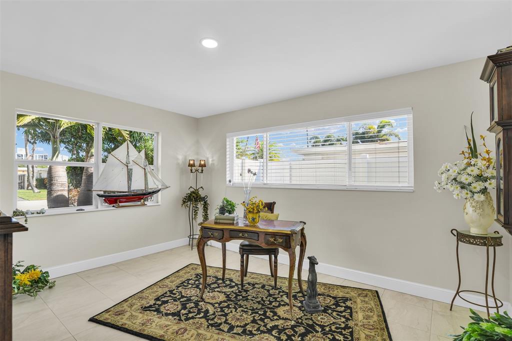 1616 Southeast 4th Street Deerfield Beach, FL 33441 - Photo 33 of 52 a workspace with furniture and window