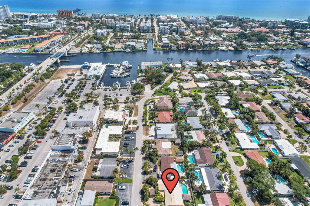 1616 Southeast 4th Street Deerfield Beach, FL 33441 - Photo 8 of 52 an aerial view of residential building and lake view
