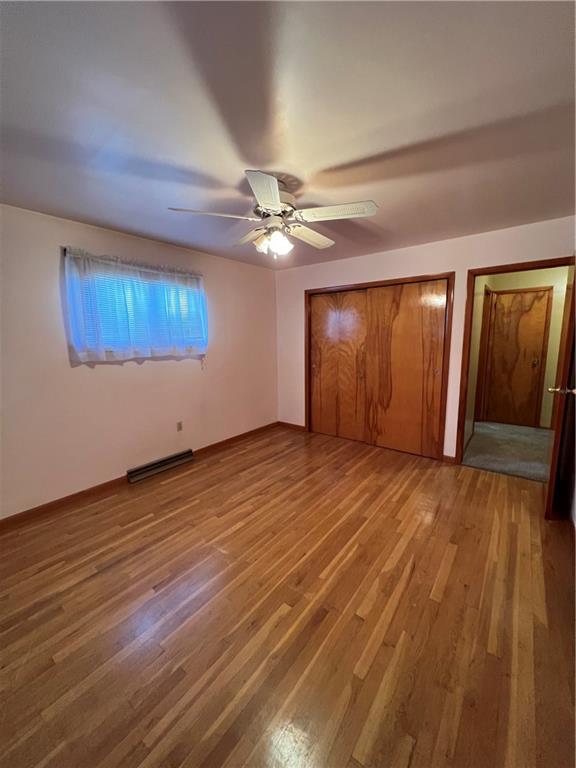150 Wall Street Rochester, PA 15074 - Photo 11 of 23 wooden floor in an empty room with a window