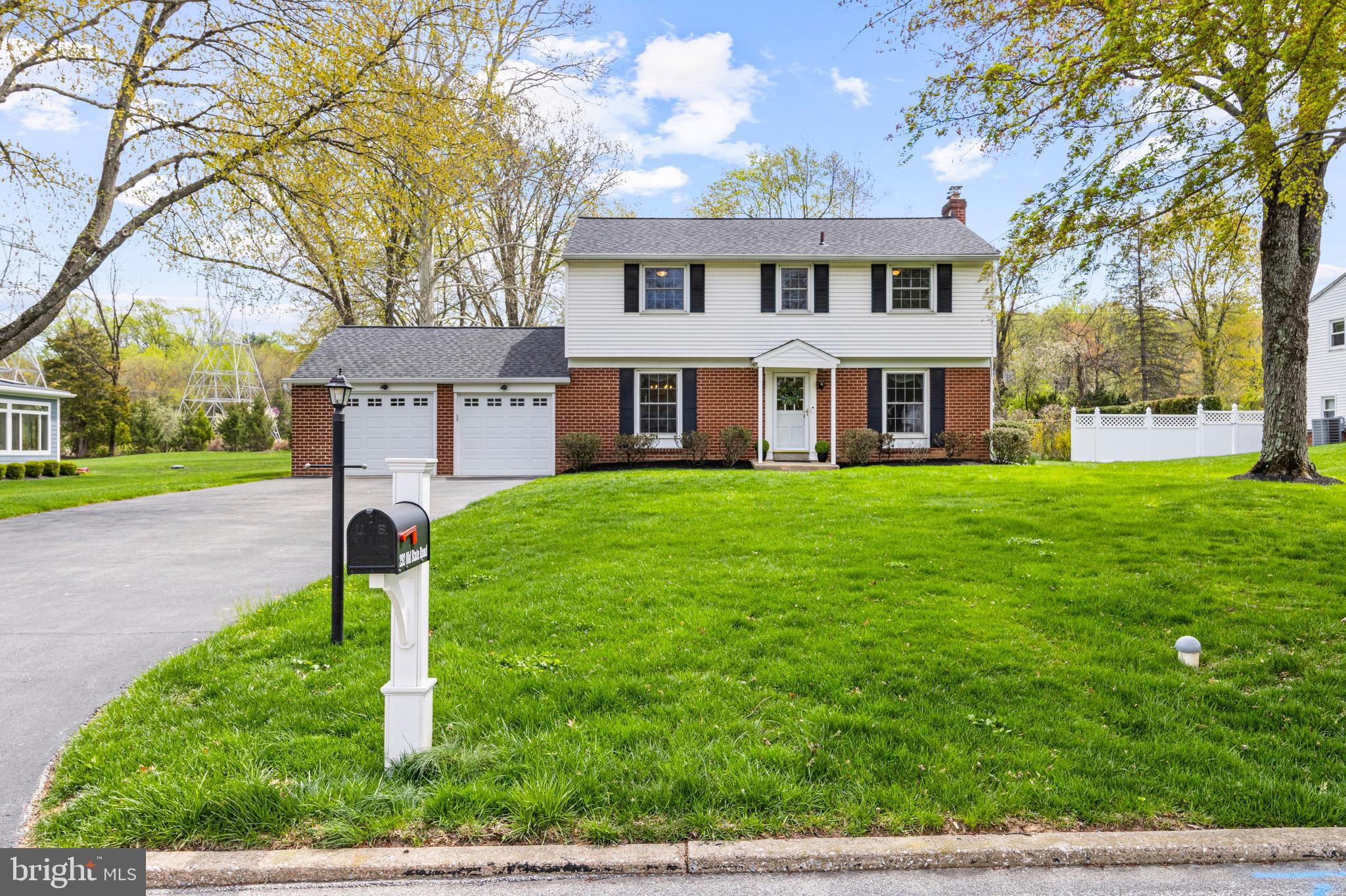 292 Old State Road Berwyn, PA 19312 - Photo 1 of 43 a front view of a house with a yard