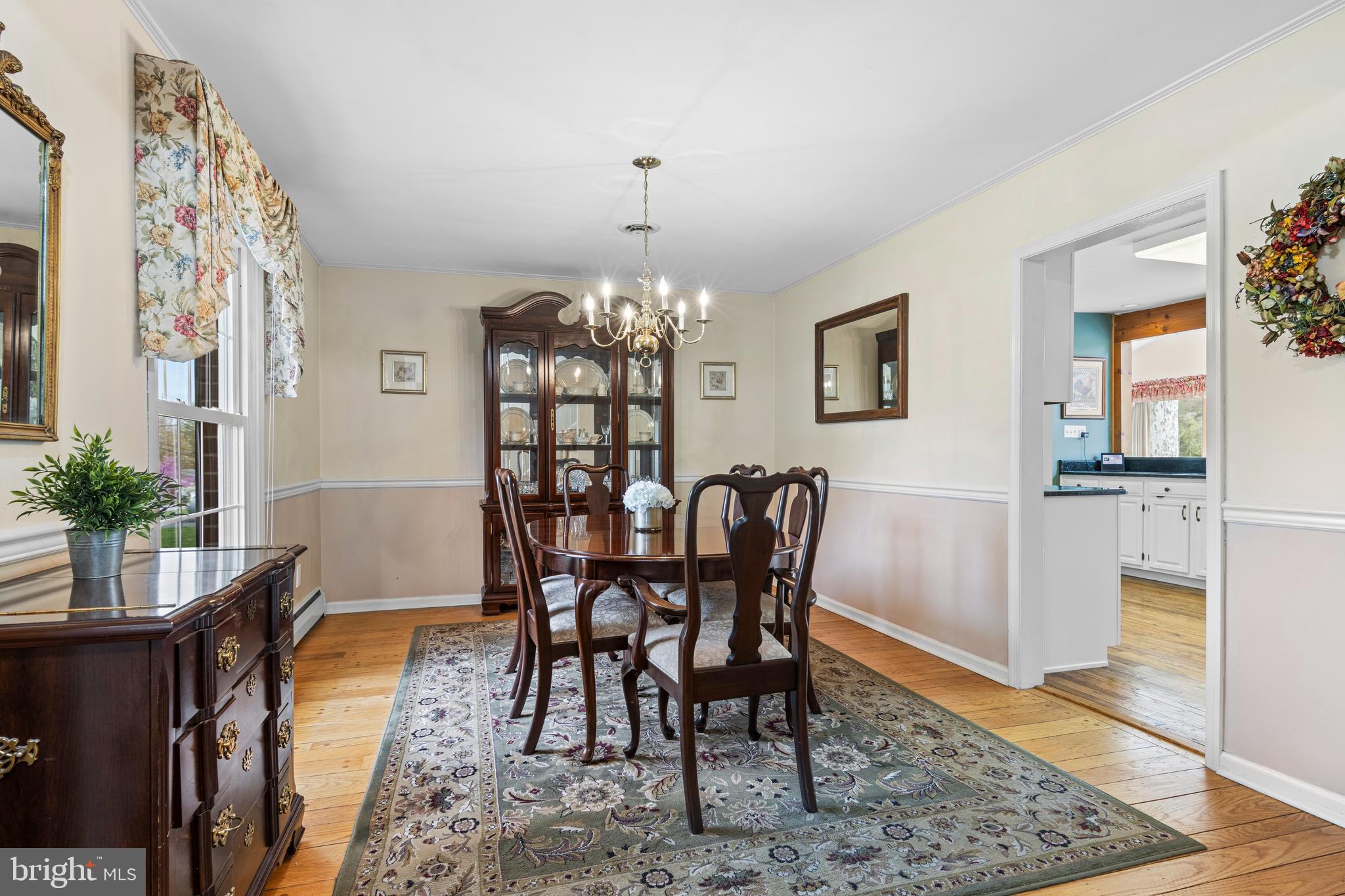 292 Old State Road Berwyn, PA 19312 - Photo 12 of 43 a view of a dining room with furniture and chandelier