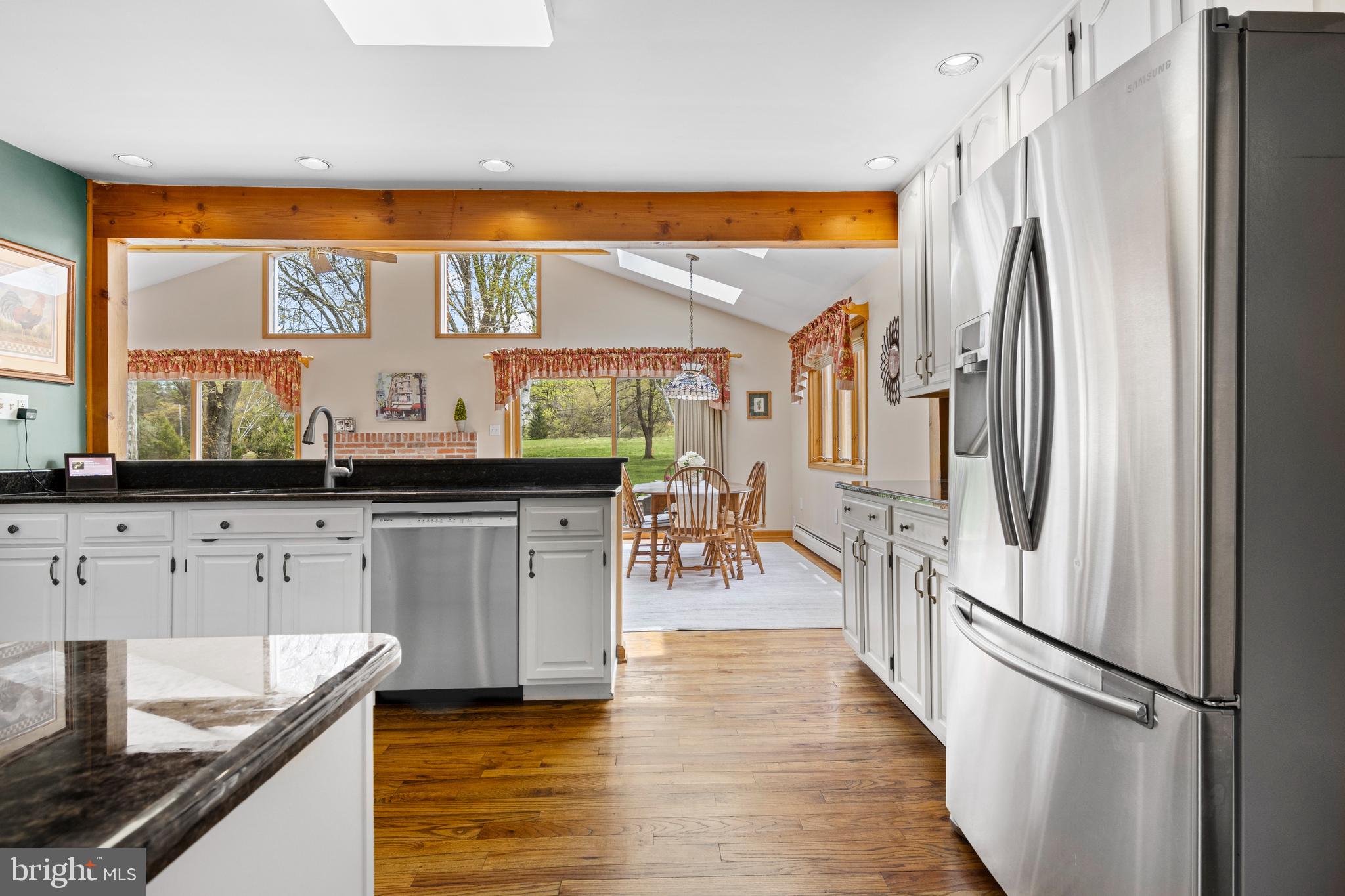 292 Old State Road Berwyn, PA 19312 - Photo 17 of 43 a kitchen with stainless steel appliances granite countertop a refrigerator and a sink