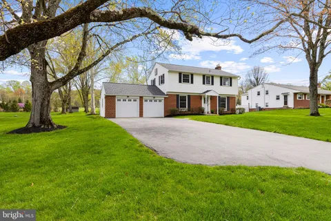 a view of a big yard next to a house