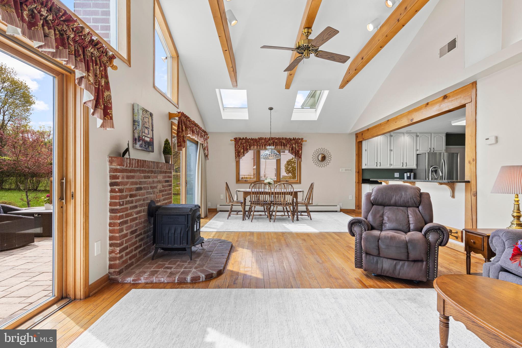 292 Old State Road Berwyn, PA 19312 - Photo 21 of 43 a living room with furniture and a floor to ceiling window