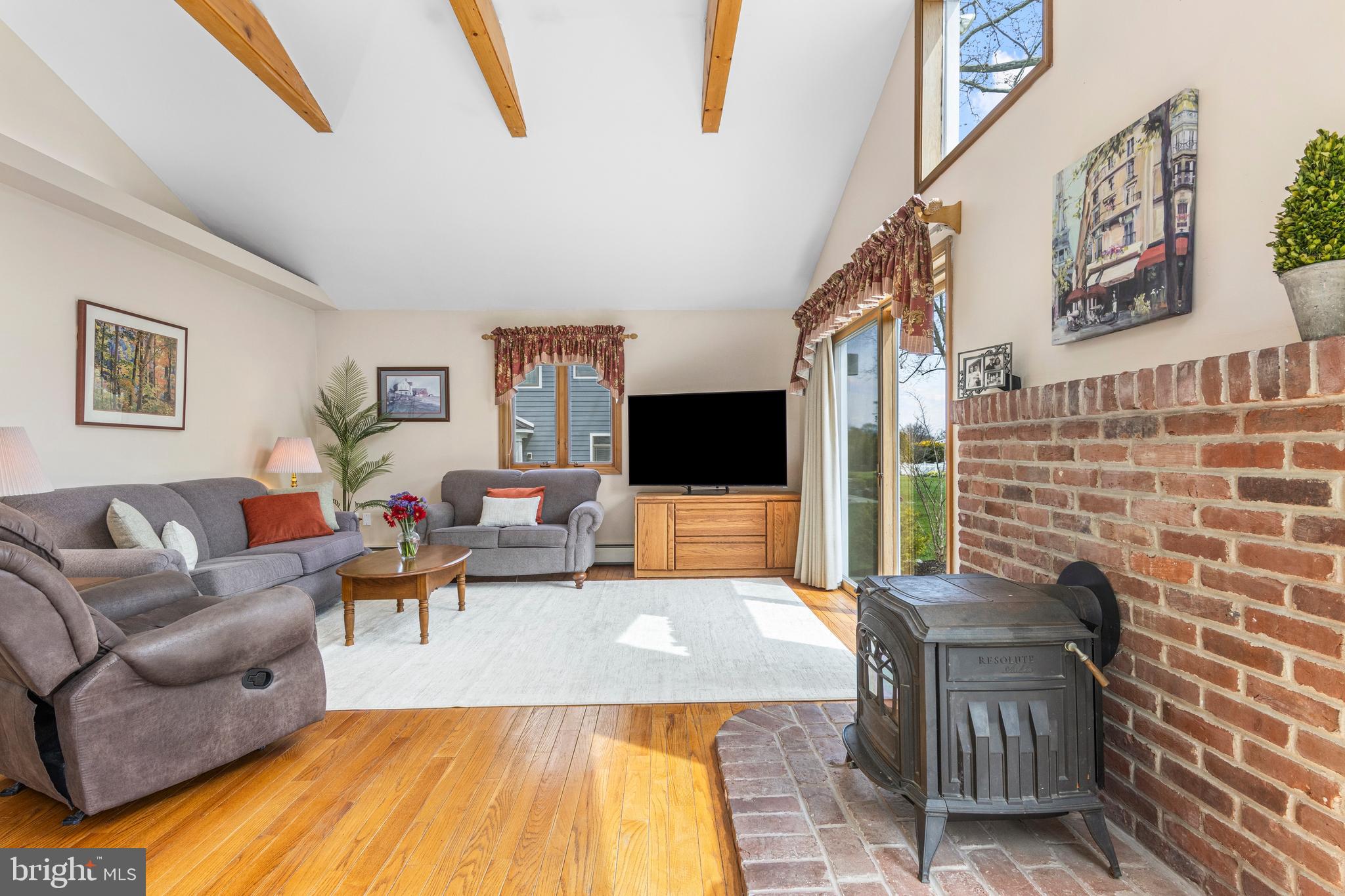 292 Old State Road Berwyn, PA 19312 - Photo 22 of 43 a living room with furniture and a flat screen tv