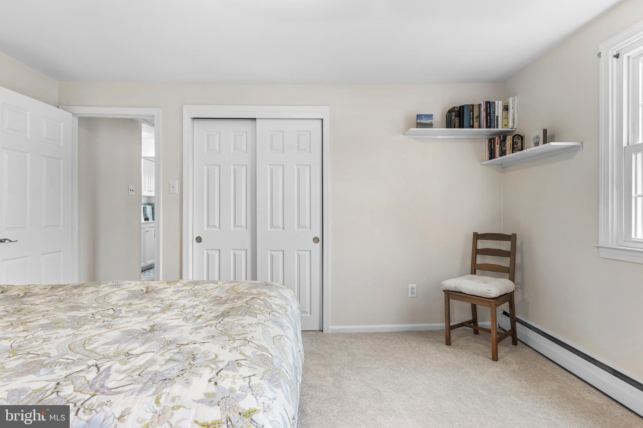 292 Old State Road Berwyn, PA 19312 - Photo 33 of 43 a bedroom with a bed and a chair