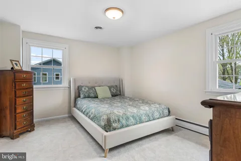 a view of an empty room with stairs