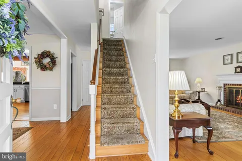 a view of entryway with wooden floor