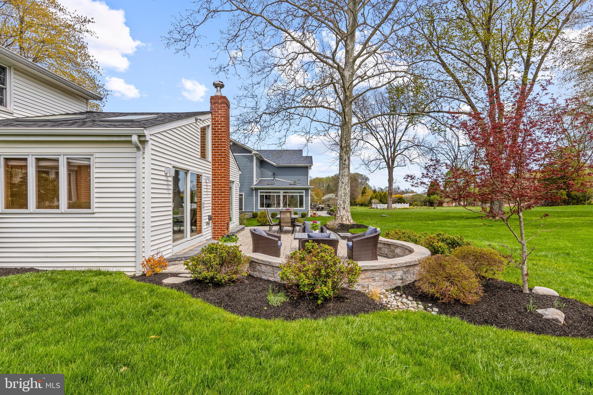 292 Old State Road Berwyn, PA 19312 - Photo 43 of 43 a view of a house with backyard sitting area and garden