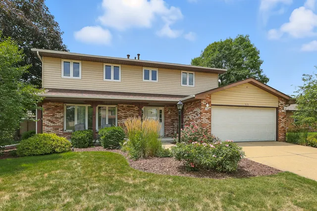 a front view of house with yard