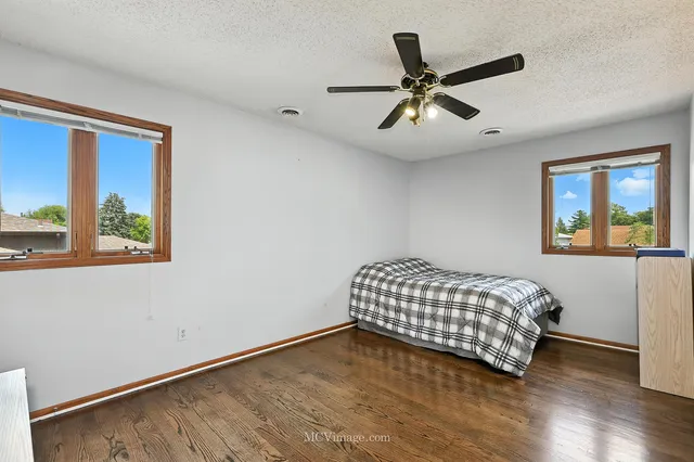 a room with bed and window