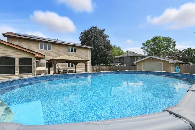 a house view with a garden space